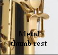 Metal thumb rest